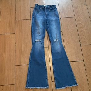 Flared Bootcut Jeans Mid-rise Women Size 1/25 Medium wash Blue Small Rips Frayed
